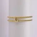Gold-plated double layer beaded bracelet with letter L charm, elastic stretch design. - Letter L