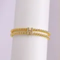Double-layer gold plated beaded bracelet featuring a sparkling zircon letter H charm. - Letter H