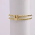 Gold beaded double layer bracelet with U letter charm, 18k gold plated brass jewelry item. - Letter U