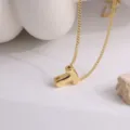 Collier pendentif lettre initiale dorée, variante de chaîne de clavicule brillante en métal. - Lettre T