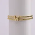Gold-plated double strand beaded bracelet with chunky puffy letter W charm for women. - Letter W