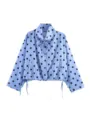 Blusa azul de manga larga con lunares negros, elegante cuello con cordón ajustable y botones. - XS / Tops / Azul