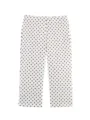 Detailed view of women's mid-waist black and white polka dot casual pants for elegant style. - XS / Bottoms / White Pants