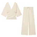 Beige two-piece women's set featuring a deep V-neck top and comfortable drawstring wide-leg pants. - S / Top And Bottom / Off White
