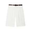 Detailed view of white high-waisted pleated shorts featuring stylish brown croc-embossed belt. - S / White