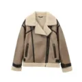 Detailed view of women's stylish faux shearling biker jacket with contrast leather trim. - XS / Khaki
