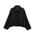 Black batwing sleeve jacket detail view, soft texture fabric, classic lapel collar design. - Black