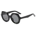 Klobige runde Sonnenbrille in Schwarz, lässiger UV-Schutz für stylische Streetwear und Fotoshootings. - Schwarzer Rahmen Graue Gläser