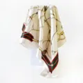Detail shot of vintage chain print square silk scarf with classic red green striped border. - D9019-Beige Apricot