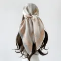 Detailed close-up view of the retro paisley print square scarf tied elegantly on hair. - 90*90cm / White