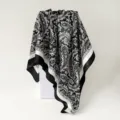 Detail view of the black and white satin paisley spliced square scarf, elegant 90cm texture. - D9506 - Black