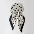 Detailed view of the black and white polka dot satin head scarf cap, smooth texture and nice print. - White Polka Dot