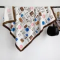 Detailed view of luxury twill silk square scarf with classic fashion icons print. - RY-15