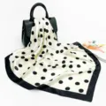 Detailed showcase of the classic black and white polka dot silk square scarf for women. - D9208-White