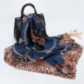 Detailed view of a dark blue leopard print baroque chain silk scarf, 90cm square scarf. - D9189-Royal Blue