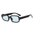 Schwarze kleine Sonnenbrille mit blauen Gläsern und Stern-Detail, modische Brillen-Variante. - Glänzender schwarzer Rahmen Blaue Linse (C14)