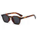 Retro Schildpatt runde Sonnenbrille mit schwarzen Gläsern und goldenen Bügeldetails stilvoll. - Schildpatt Tee Rahmen Graue Linse