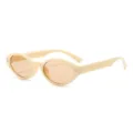 Schicke ovale Sonnenbrille fuer Damen mit UV Schutz, beigem Gestell und Stern Details. - C12 Glänzend Schwarz Rahmen G15 Gläser