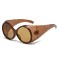 Brown oval oversized sunglasses with ribbed side shield, retro quirky fashion eyewear. - Transparent Tea Frame Tea Lens
