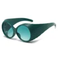 Trendy retro oval sunglasses for women with unique side shield design and gradient lenses. - Green Frame Gradient Green Lens