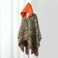 Ethnic style knitted hooded cape shawl, dark green paisley pattern with bright orange hood. - Small Paisley / Cloak / Orange