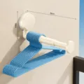 Suction cup retractable clothes hanger rack, off-white wall mounted storage organizer. - 1 Piece/Pack / Creamy White
