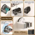 Suction mop holder for bathroom wall mounting, punch-free sticky broom clip storage rack. - 1 Piece/Pack / Creamy White