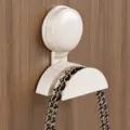 Beige suction cup hook, durable plastic wall mount bag hanger for bathroom and entryway use. - 1 Piece/Pack / Creamy White