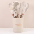 Silicone kitchen utensil set in beige with marble handles, durable cooking tools in holder. - Marbled White
