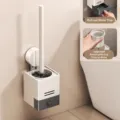Wall-mounted suction toilet brush holder with drip tray, space-saving bathroom cleaning tool. - Suction Toilet Brush Set / Cream