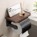 Wall-mounted toilet paper holder with wooden shelf and phone storage for bathroom use. - Luxury Cover Tissue Holder