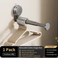 Wall-mounted retractable clothes hanger organizer with strong suction cup for balcony and dorm. - 1 Piece/Pack / Gunmetal
