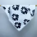 Close-up detail view of elegant white silk scarf with stunning black floral print and lace. - White Floral / 70-70cm