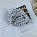 Detailed view of a vintage polka dot chiffon summer scarf, lightweight, elegant and stylish. - White Small Polka Dot