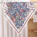 Detailed view of the colorful paisley print silk square scarf showcasing fine fabric texture. - RY-19