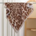 Close-up detail of brown square silk scarf with abstract cracked pattern hanging on rod. - Striped - Brown