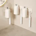 Cream magnetic toothbrush holder wall mounted mouthwash cup set 3 cups bathroom storage rack - 3-Cup Toothbrush Holders / Creamy White
