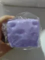 Close up detail view of the purple cheese shaped slow rebound decompression toy in wrap. - Vaseline Filling / 6cm Bagged / Blueberry