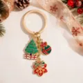 Detailed close-up view of the Christmas metal keychain with cute enamel tree and gift box charms. - Tree Gift Box Snowflake Style (YSK-12-3)