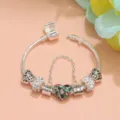 Charm bracelet detail featuring silver snake chain, crystal pavé beads, and heart pendant. - Length 17CM / KM-02 (Rose Gold Safety Chain Rhinestone Style)