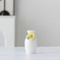 Mini ceramic vase with handmade yellow blue flowers, elegant white home decor piece. - 2A