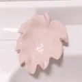 Pink leaf-shaped soap dish, ceramic or plastic soap holder for bathroom sink drainage. - Pink