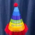 Colorful rainbow paper cone birthday party hat with red pom poms for kids celebration - Red Cone Hat / Red