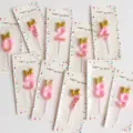 Pink number birthday candles with cute gold bow for kids cake decoration, numbers 0 to 9. - Gold Bow Knot Candles