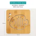Square bamboo heat insulation pad for kitchen dining table, hollow fish design trivet 16cm - 16cm Bubble Fish Hollow Place Mat