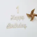 Wooden number one and Happy Birthday cutout details for party decoration scene. - 1+ Happy Birthday Windmill