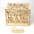 Detailed view of the wooden wedding card box featuring intricate cutout floral patterns. - JM01377 Large Box
