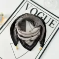 Close-up detail of vintage printed square scarf with horse motifs and metal magnetic clasps. - Magnetic Buckle Style 18