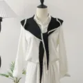 Stijlvolle gebreide dames sjaal omslagdoek gecombineerd met witte blouse met lange mouwen. - 100*29cm / Zwart