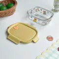 Cute cartoon print glass lunch box with yellow airtight lid, microwave safe food container. - Raccoon Dog - Oval Glass Lunch Box without Compartments
